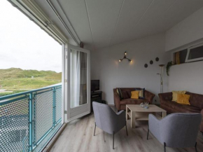 Furnished home with balcony